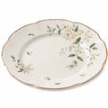 Runder Porzellanteller mit Blumenmotiv und Goldrand, 30 cm